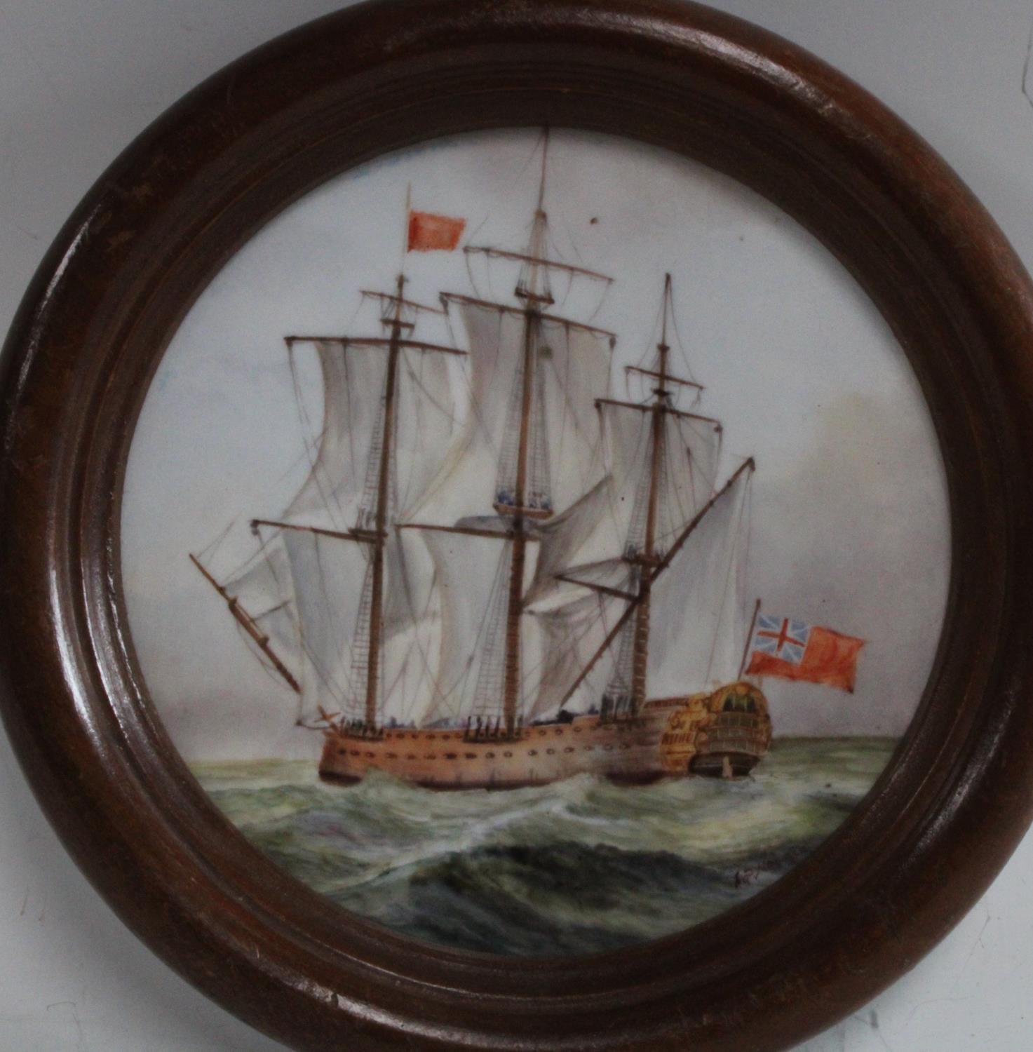An English porcelain circular maritime plaque, painted by Stefan Nowacki, signed,