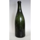 A 19th century green wine bottle, kick-up base,