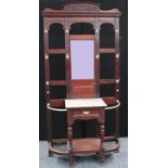 A late 19th/early 20th century mahogany hall stand,