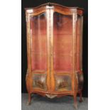 A 19th century Louis XV Revival gilt metal mounted mahogany and Vernis Martin bombe shaped vitrine,