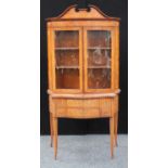 A Sheraton Revival satinwood and marquetry serpentine display cabinet,