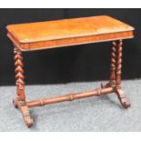 A Victorian oak centre table, rounded rectangular top above a shallow frieze drawer,