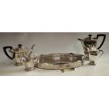 An Art Deco silver plated four piece tea service; gallery tray;