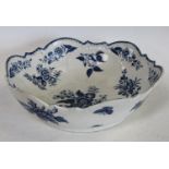 A Worcester Pomegranate pattern shell moulded junket bowl, printed in blue with pine cones,