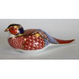 A Royal Crown Derby paperweight,