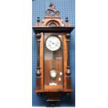 A late 19th century Vienna wall clock, surmounted by a horse, white enamel dial,