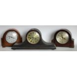 A mid 20th century oak cased mantel clock;