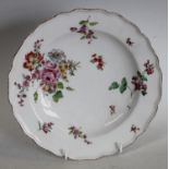 A Chelsea shaped plate, painted in Meissen style with a large bouquet and scattered flower sprays,