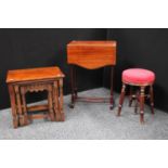A Victorian mahogany height-adjustable piano stool;