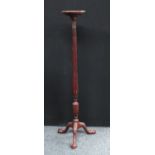 A George II style mahogany tripod torchere, ball and claw feet,