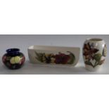 Two Moorcroft vases and one Hibiscus flower trough,