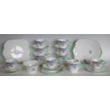 A Shelley floral pattern part tea service comprising 9 cups, 12 saucers, 10 side plates,