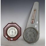 A Retro aneroid barometer thermometer,