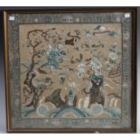 An Oriental textile wall panel, woven throughout with figures in traditional dress,