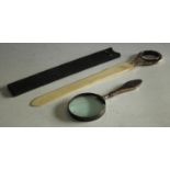 A silver and tortoiseshell hafted magnifying glass,