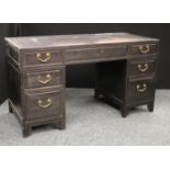 A Chinese hardwood desk, rectangular panel top with three frieze drawers,