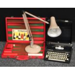 A late 20th century Anglepoise desk lamp; a Silver-Reed Silverette portable typewriter;