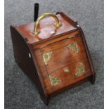 A late 19th century mahogany coal box,