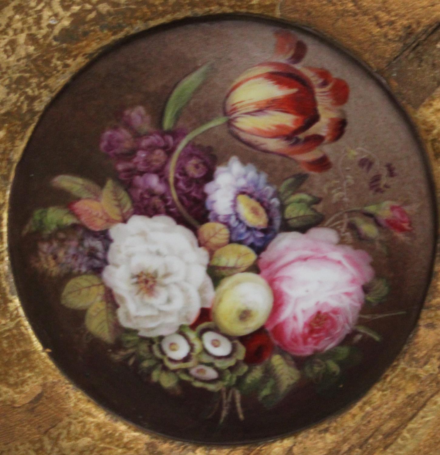 An early 19th century English porcelain circular plaque,