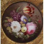 An early 19th century English porcelain circular plaque,