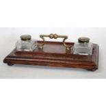 An early 20th century oak inkstand, c.