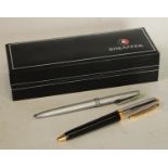 Pens - a Sheaffer lady's ball point pen, brushed steel finish; another Sheaffer ball point pen (2),