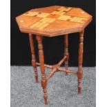 An early 20th century oak, mahogany and parquetry combination games and occasional table,