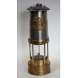 An miners lamp, by E Thomas & Williams,