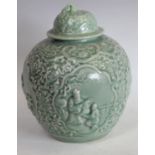 A Chinse celadon ovoid wine jar and cover,