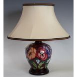 A Moorcroft Pansy pattern table lamp,