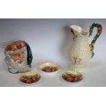 Ceramics - a Clarice Cliff celtic harvest jug, Royal Doulton Neptune character jug,