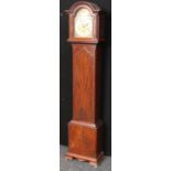 A mahogany longcase clock of small proportions or 'grandmother' clock,