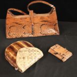 A vintage snakeskin bag; another,