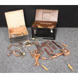 An ammunition box of tools;