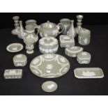 Wedgwood Green Jasperware including teapot, pair of urn vases, pair of candlesticks,