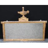 A Neo-Classical chimney glass, the rectangular mirror plate crested by an urn in the Adam taste,