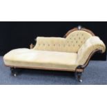 A Victorian ebonised and parcel-gilt chaise longue/day bed,
