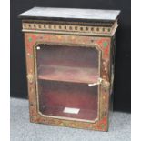 A 19th century ebonised pier cabinet, in the manner of André Charles Boulle,