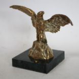 An early 20th century desk weight, cast as an eagle,