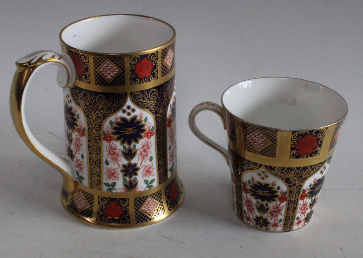 A Royal Crown Derby 1128 pattern tankard, approx 14cm in height; a similar beaker,