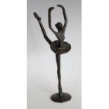 A metal sculpture of a Ballerina in the style of Degas