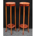 A pair of mahogany inlaid jardiniere stands