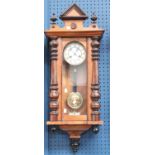 A late 19th century Vienna wall clock, mahogany case, white enamel dial,