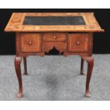 An '18th century' oak lowboy, associated oversailing top,