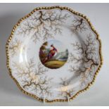 A Flight Barr & Barr shaped circular plate, painted to centre by Davis with an exotic bird,
