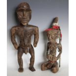 Tribal Art - an African figure, standing,