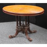 A Victorian walnut centre table, elliptical top,