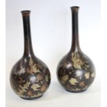 A pair of WMF ovoid bottle vases