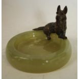 An Austrian cold painted bronze, of a dog, mounted on a green onyx dish, c.