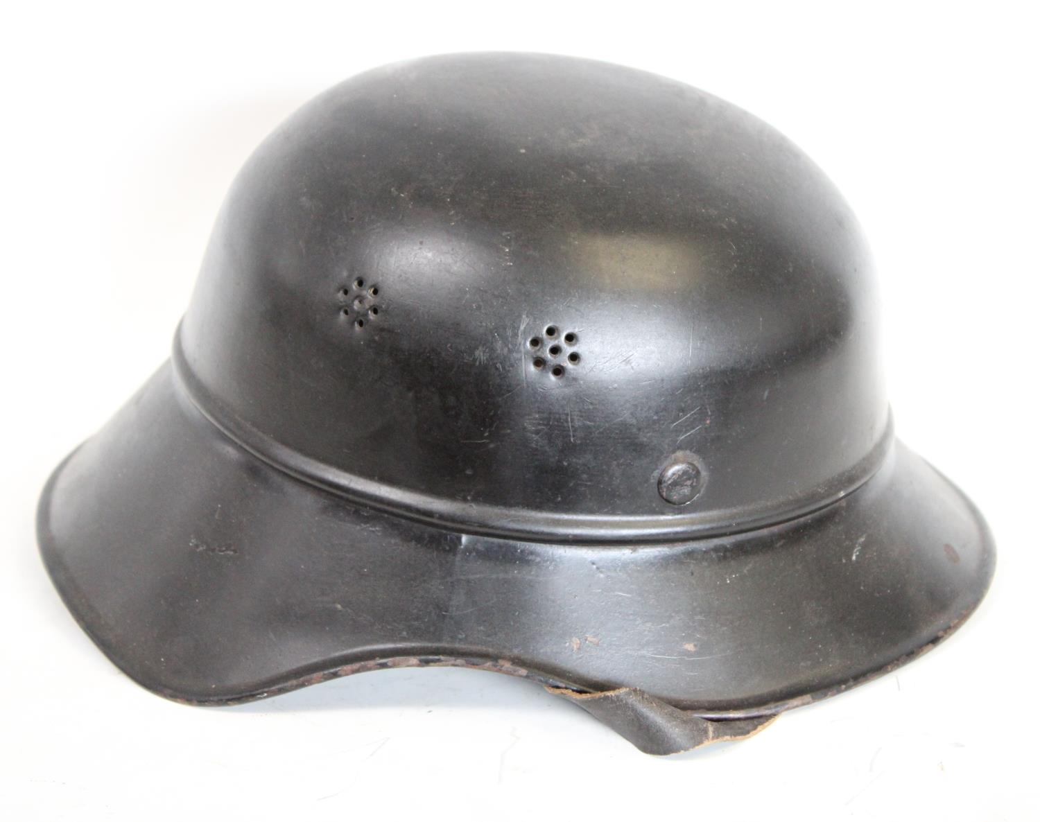 World War II - A Third Reich Nazi German M34 Feuerwehr 'salt shaker' civic stalhelm helmet,